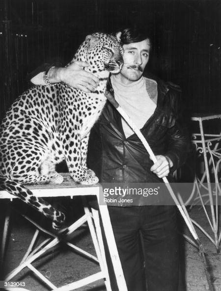 5th November 1976: Dickie Chipperfield a member of the circus family hugs his performing leopard, 'Cindy' but has a whip handy. (Photo by Robin Jones/Evening Standard/Getty Images)